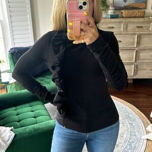 Ruffled zip up jacket.